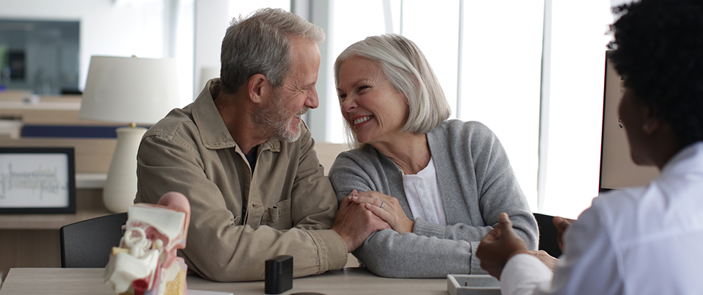 Man and woman smiling at eachother